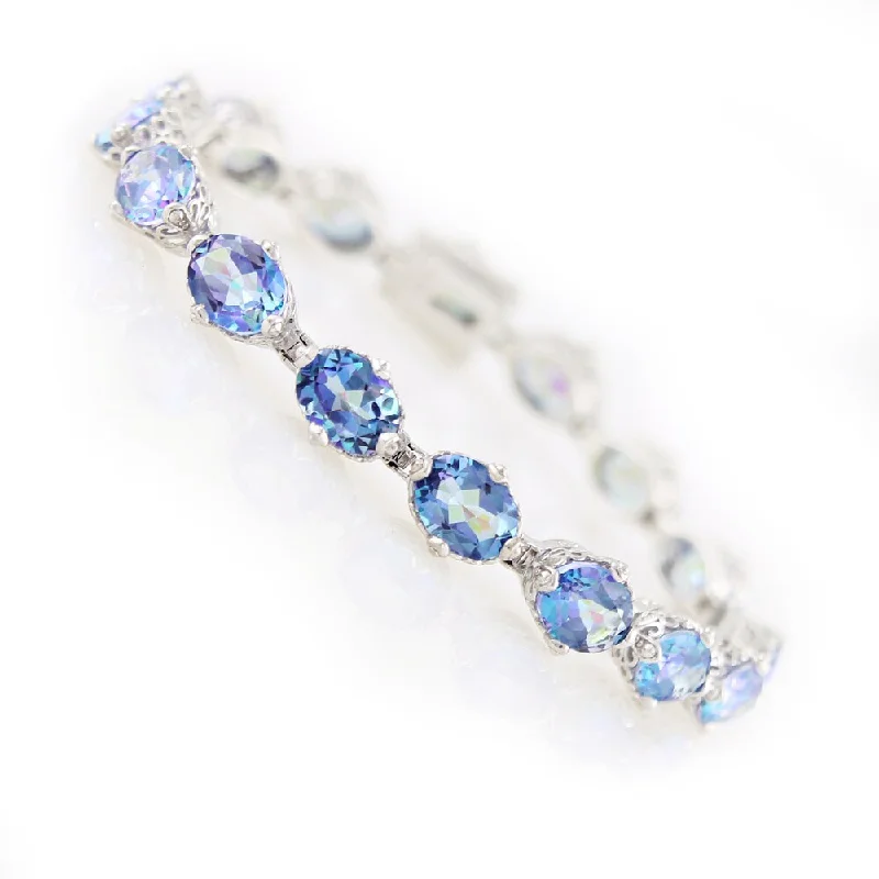 women elegant bracelets -Platinum Over Sterling Silver Blue Millenium Topaz Tennis Bracelet