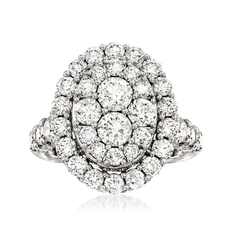 women wedding and engagement rings -Ross-Simons Diamond Cluster Oval Ring in 14kt White Gold